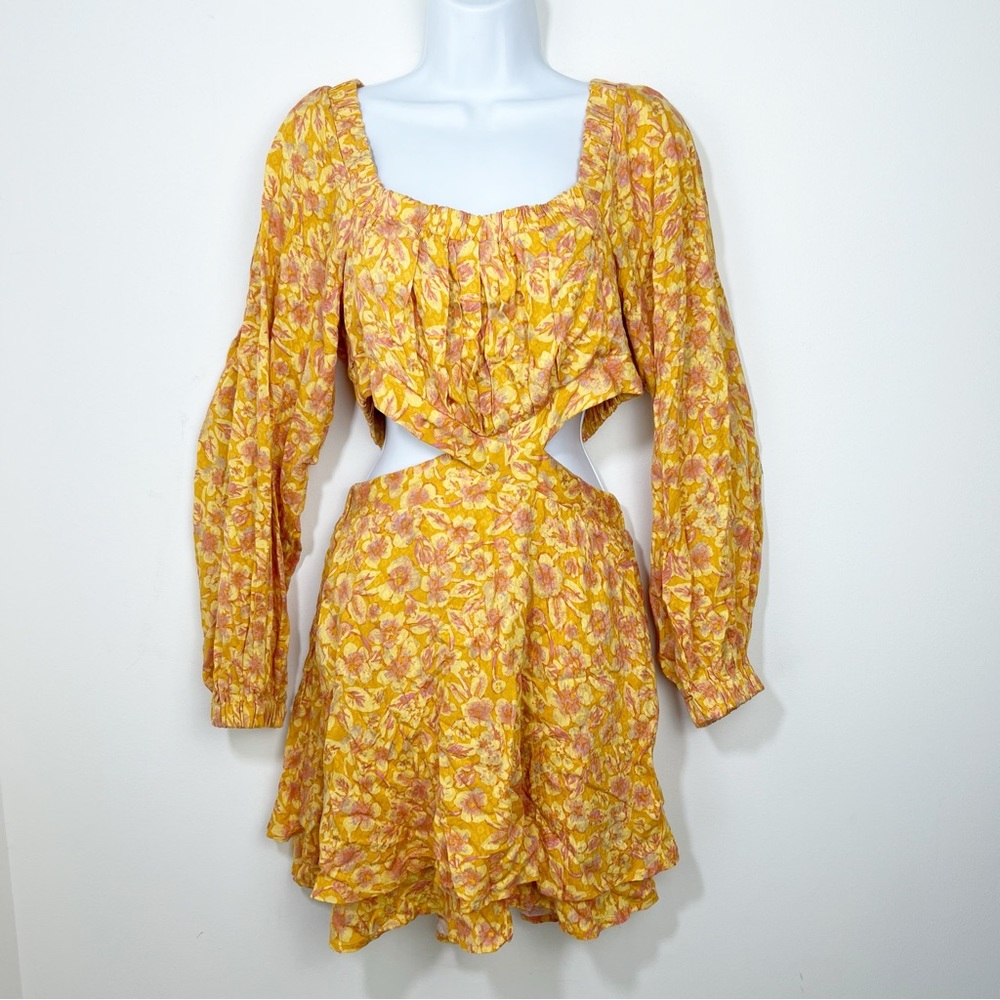 Free People Jael Printed Mini Dress Size 
Medium Cut Out sides Yellow Floral
